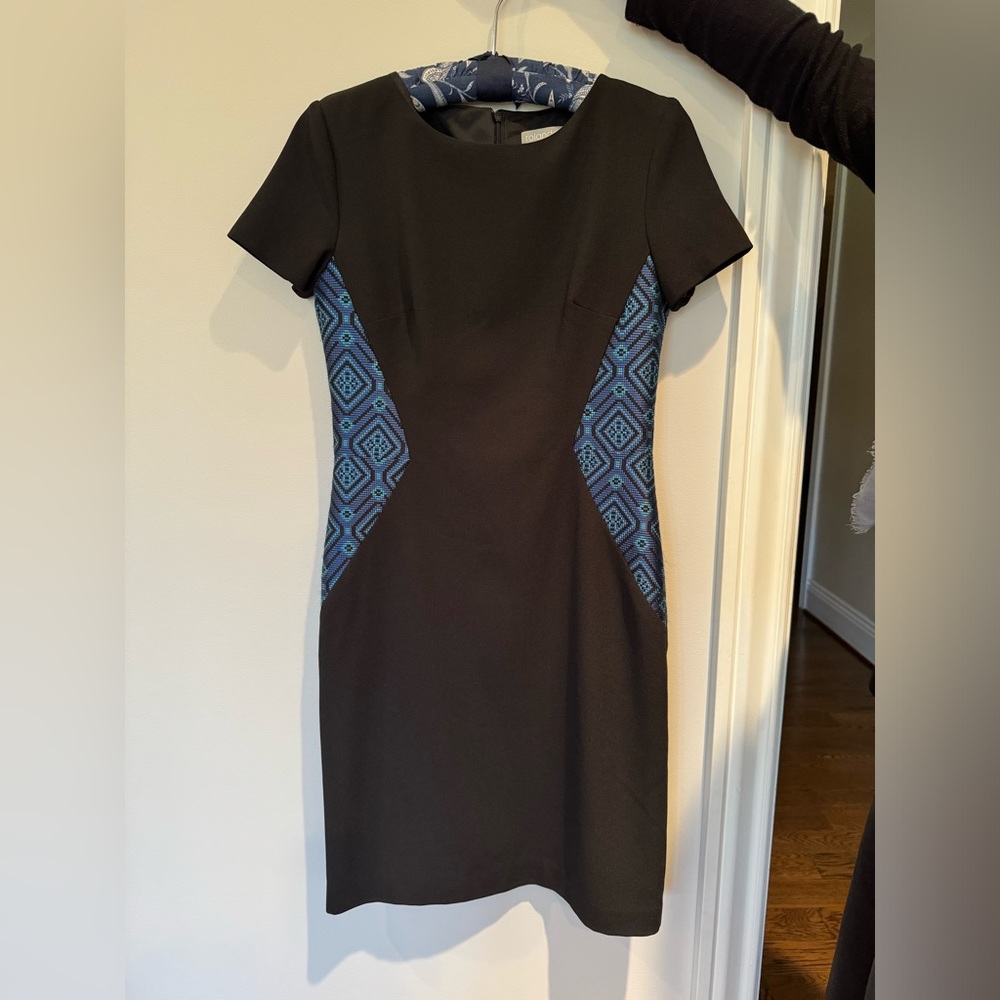 Rolando. Black dress with royal blue inserts at waist line.